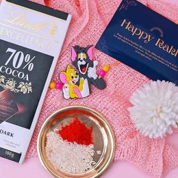Tom & Jerry Kids Rakhi & Lindt Bar - Australia Delivery Direct Tom & Jerry Kids Rakhi & Lindt Bar - Australia Delivery Direct