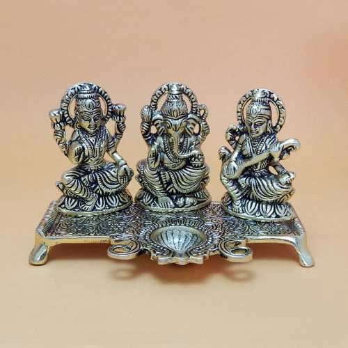 White Metal Lord Ganesh With Goddess Lakshmi & Saraswati