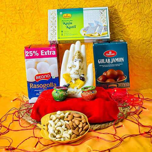 Palm Ganesha Two Designer Diya  & Sweets - USA Delivery Direct
